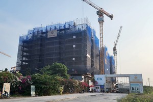 Có nhiều lý do khiến doanh nghiệp chưa “mặn mà” với nhà ở xã hội. Ảnh: Việt Dũng