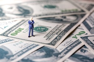 Theo tính toán của Bloomberg, để lọt vào 1% tinh hoa là những người giàu có nhất nước Mỹ, cần kiếm được khoảng 488.000 USD/năm. Ảnh minh hoạ. (Nguồn: Internet)