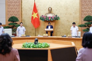 Mở đầu phiên họp, Chính phủ đã dành phút mặc niệm tưởng nhớ Tổng Bí thư Nguyễn Phú Trọng. (Ảnh: Nhật Bắc)