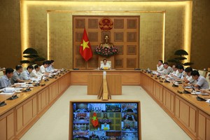 Các đại biểu nêu ý kiến tại cuộc họp. (Ảnh: VGP/Minh Khôi)