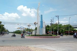 Trục đường giao thông khu vực trung tâm thị xã Bình Minh, tỉnh Vĩnh Long. Ảnh: Báo Vĩnh Long