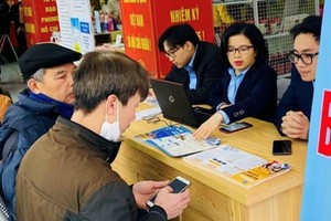 Yên Bái đẩy mạnh thanh toán lương hưu, trợ cấp bảo hiểm xã hội không dùng tiền mặt