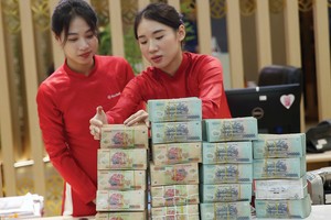 Cân đối thanh khoản trong bối cảnh tăng trưởng tín dụng cao và lãi suất huy động thấp là bài toán đang đặt ra với các ngân hàng