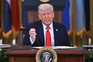 Tổng thống Donald Trump cho biết Mỹ sẽ sớm ký một thỏa thuận về khoáng sản với Ukraine. Ảnh: AFP