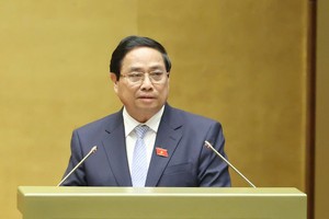 Thủ tướng Phạm Minh Chính trình bày báo cáo - Ảnh: Duy Linh 