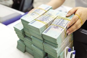 Cơ chế xử lý tài sản thế chấp hiệu quả sẽ giúp bảo vệ tổ chức tín dụng trước nguy cơ nợ xấu, thúc đẩy mở rộng tín dụng. Ảnh: Đ.T 