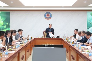 Cục trưởng Cục Quản lý nợ và tài chính đối ngoại Nguyễn Quốc Phương phát biểu tại hội nghị. (Ảnh: Đức Minh)