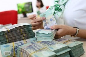 Tiền chảy vào ngân hàng đang sụt giảm