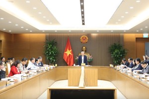 Phó thủ tướng Thường trực Chính phủ Nguyễn Hòa Bình chủ trì cuộc họp. Ảnh: VGP