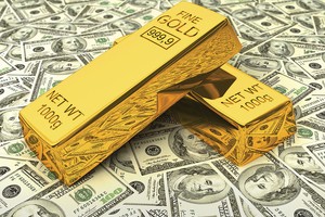 Vàng và tỷ giá nhiều thời điểm “rượt đuổi” nhau