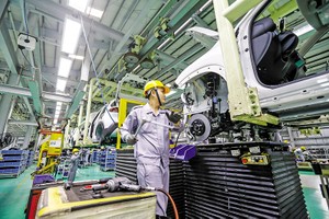 Tỷ trọng công nghệ cao còn thấp, ngay cả của các doanh nghiệp có vốn đầu tư nước ngoài. Ảnh: Đức Thanh 