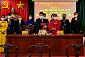 FPT hợp tác với tỉnh Bình Phước thúc đẩy chuyển đổi số