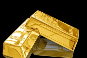 Chờ Fed họp, vàng tạm lùi về dưới 1.250 USD/ounce