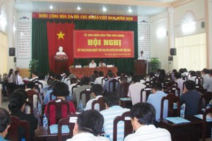 Quang cảnh Hội nghị Đối thoại doanh nghiệp trên địa bàn huyện đảo Phú Quốc năm 2014