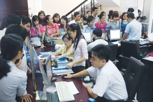 Ngành thuế đang chịu áp lực nặng nề để hoàn thành dự toán thu ngân sách 2015 