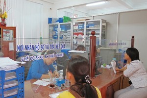 Tính đến quý II/2014, tổng số nợ BHXH - BHYT lên đến trên 11.190 tỷ đồng