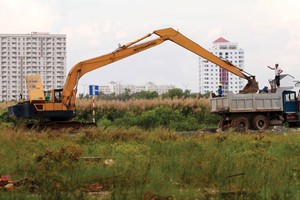 Thủ tục hành chính và cách tính thuế tiền sử dụng đất là những khâu mà các chủ đầu tư bất động sản bị vướng nhiều nhất - Ảnh minh họa: Lê Toàn