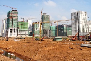 Theo ước tính sơ bộ, có hàng chục ngàn tỷ đồng được bơm vào thị trường bất động sản trong những tháng cuối năm 2014 và năm 2015 - Ảnh: Lê Toàn