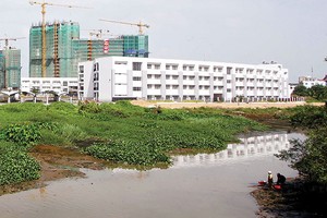 Các đại gia bất động sản lên kế hoạch triển khai hàng loạt dự án trong năm 2015 - Ảnh: Lê Toàn