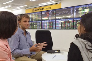 Dự kiến mở “room” cho NĐT ngoại sở hữu đến 100% công ty chứng khoán