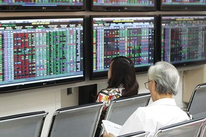 Sẽ có làn sóng thoái vốn khỏi ngân hàng, bất động sản trong năm nay