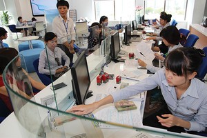 Các nhà băng mong NHNN cho biết định hướng tăng trưởng tín dụng năm tới để có kế hoạch đầu tư phù hợp