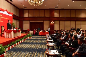 Trưa 14/9, tại thủ đô Vientiane, Thủ tướng Nguyễn Tấn Dũng gặp mặt các nhà đầu tư Việt Nam tại Lào - Ảnh: VGP/Nhật Bắc