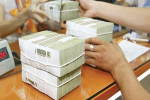 Tái cấp vốn là một giải pháp hữu hiệu, hỗ trợ các ngân hàng trong việc xử lý nợ xấu