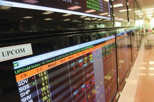 Các DN cổ phần hóa được nộp hồ sơ song song để đăng ký giao dịch trên UPCoM, hoặc niêm yết trên Sở GDCK