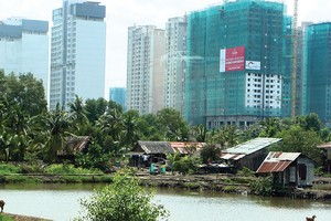 Nhiều dự án đình trệ vì vướng giải phóng mặt bằng.
Ảnh: Lê Toàn