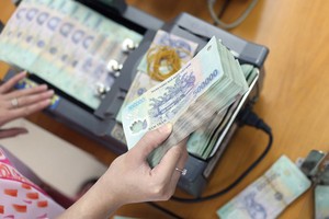 NHNN đang triển khai nhiều giải pháp để kịp thời nhu cầu tiền mặt của các đơn vị, tổ chức và cá nhân trong dịp Tết năm nay