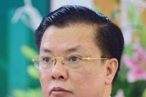 Bộ trưởng Bộ Tài chính 
Đinh Tiến Dũng 