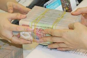 Dòng vốn vào thị trường bất động sản đang có nguy cơ bị nghẽn lại. ảnh: Dũng Minh