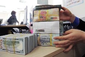 Quá trình xử lý nợ xấu không thể tách rời tiến trình cơ cấu lại hệ thống các ngân hàng