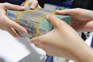 Áp lực giảm giá tiền đồng khả năng sẽ còn tiếp diễn do vẫn đang chịu tác động mạnh từ cả yếu chủ quan và khách quan