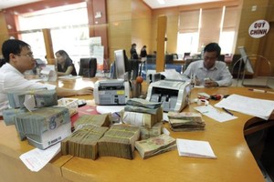 Ngân hàng chần chừ hạ lãi vay vì “mùa vàng tín dụng” đang tới 