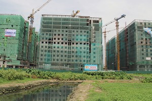 Trên thị trường Hà Nội hiện nay, số lượng dự án nhà ở có giá trên dưới 1 tỷ đồng/căn chỉ đếm trên đầu ngón tay. Ảnh: Dũng Minh