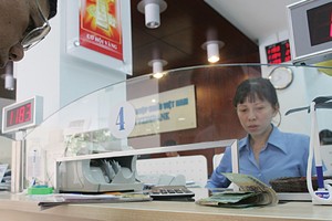 Không nên dùng cụm từ: “Dùng nguồn lực Nhà nước để xử lý nợ xấu”