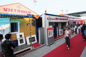Các kỳ Vietbuild thường quy tụ nhiều tên tuổi lớn trong lĩnh vực bất động sản, xây dựng, vật liệu xây dựng. Ảnh: Dũng Minh