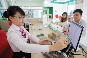 Lãi suất huy động được hầu hết ngân hàng điều chỉnh tăng nhẹ trước Tết