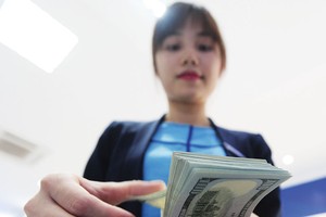 Việc tăng lãi suất đồng USD 
đã nằm trong tính toán của Ngân hàng Nhà nước