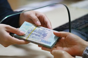 Các ngân hàng điều chỉnh lãi suất huy động là nhằm cân đối nguồn vốn, đáp ứng quy định của Thông tư 06