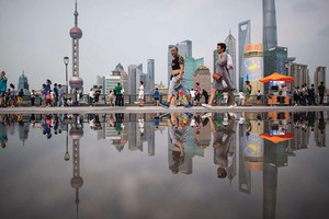 Chặn dòng đầu tư ra, M&A tại Trung Quốc bùng nổ