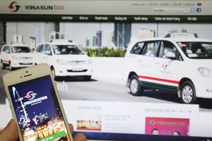 Cạnh tranh với Uber, Grab đang làm Vinasun gia tăng chi phí