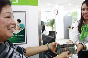 Đa số người mua nhà hiện nay đều vay vốn ngân hàng. Ảnh: Lê Toàn