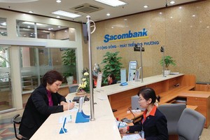 Hoạt động của Sacombank đã có nhiều cải thiện sau khi sáp nhập Southern Bank. Ảnh: Chí Cường