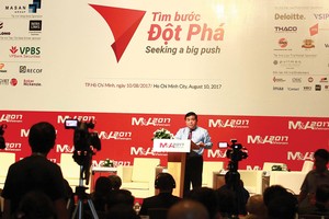 Bộ trưởng Bộ Kế hoạch và Đầu tư Nguyễn Chí Dũng 
phát biểu tại diễn đàn