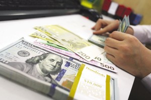 Tỷ giá USD/VND được dự báo tăng nhẹ trong những tháng cuối năm