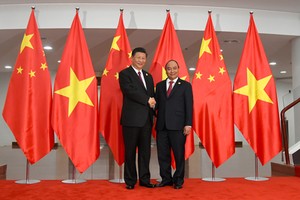 Thủ tướng Chính phủ Nguyễn Xuân Phúc và Tổng Bí thư, Chủ tịch nước Trung Quốc Tập Cận Bình. Ảnh: VGP/Quang Hiếu