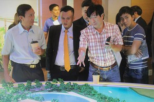 Thị trường bất động sản chưa thể có “bong bóng” và thời điểm này. Trong ảnh là lễ mở bán Dự án Thủ Thiêm Dragon (quận 2, TP.HCM).Ảnh: Gia Huy